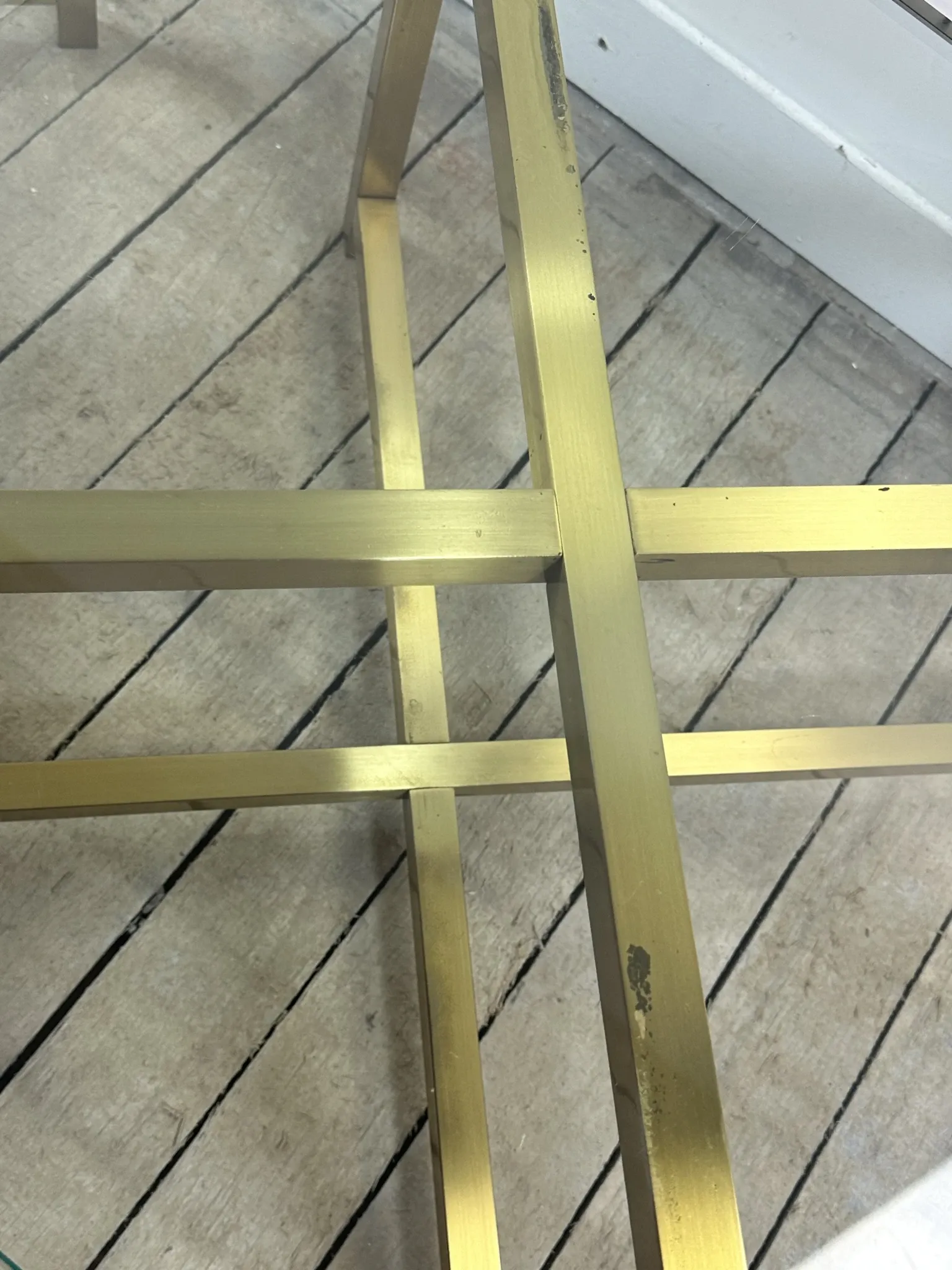 Pair of Italian brass and glass side tables from the 1970s.