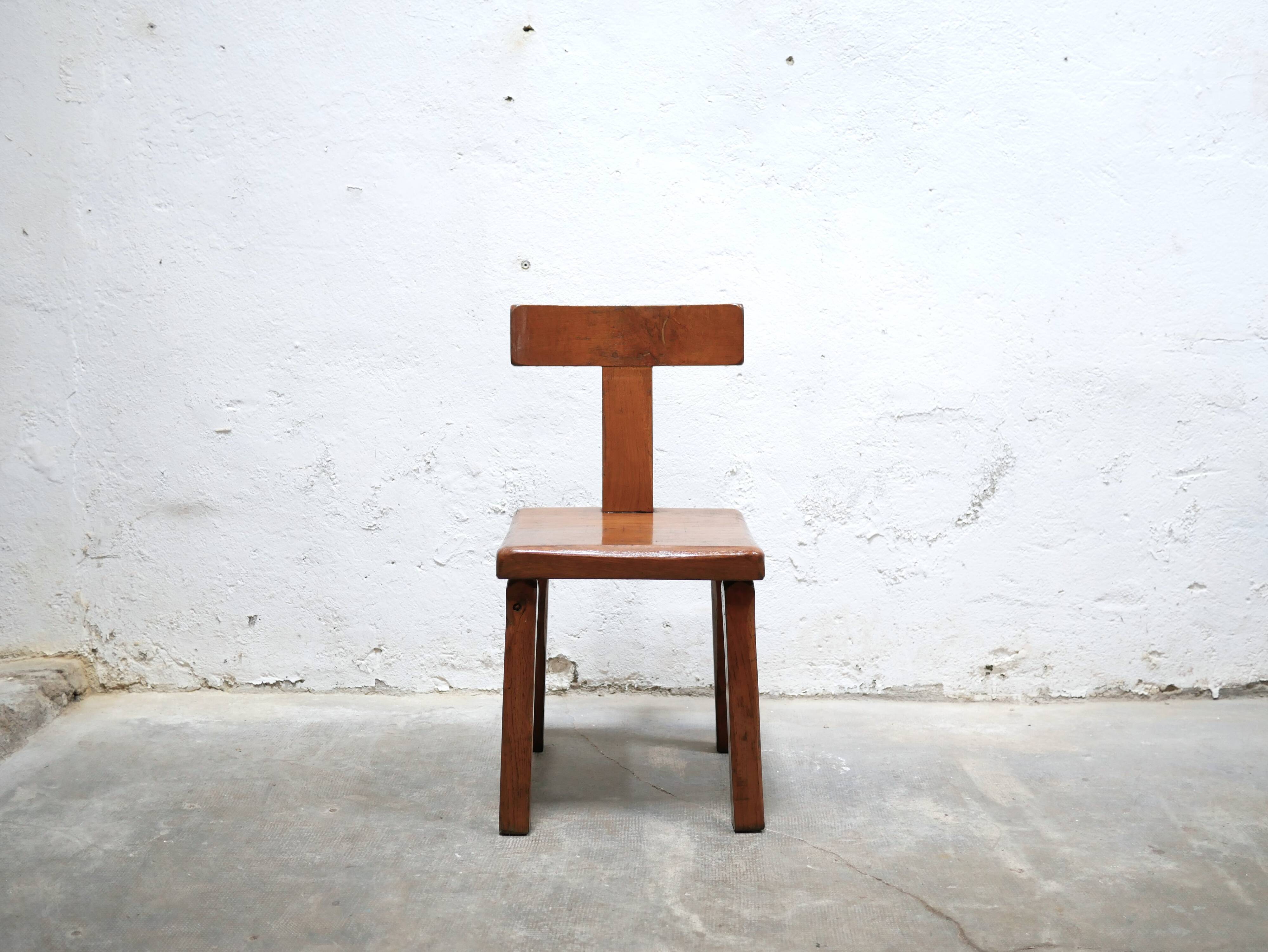 Vintage brutalist wooden T chair
