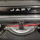 Machine à écrire Japy portable ancienne avec son coffre comme neuve