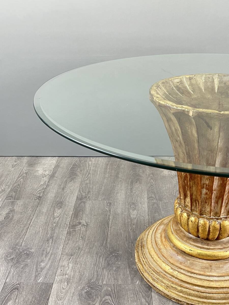 Table with a central carved wooden base, 20th century