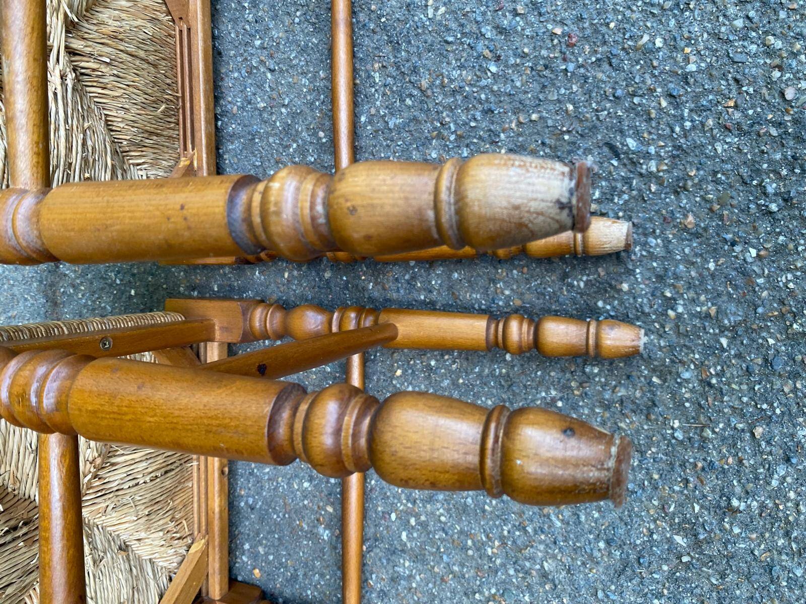 2 square stools made of carved solid wood with rush seats from the 1970s.