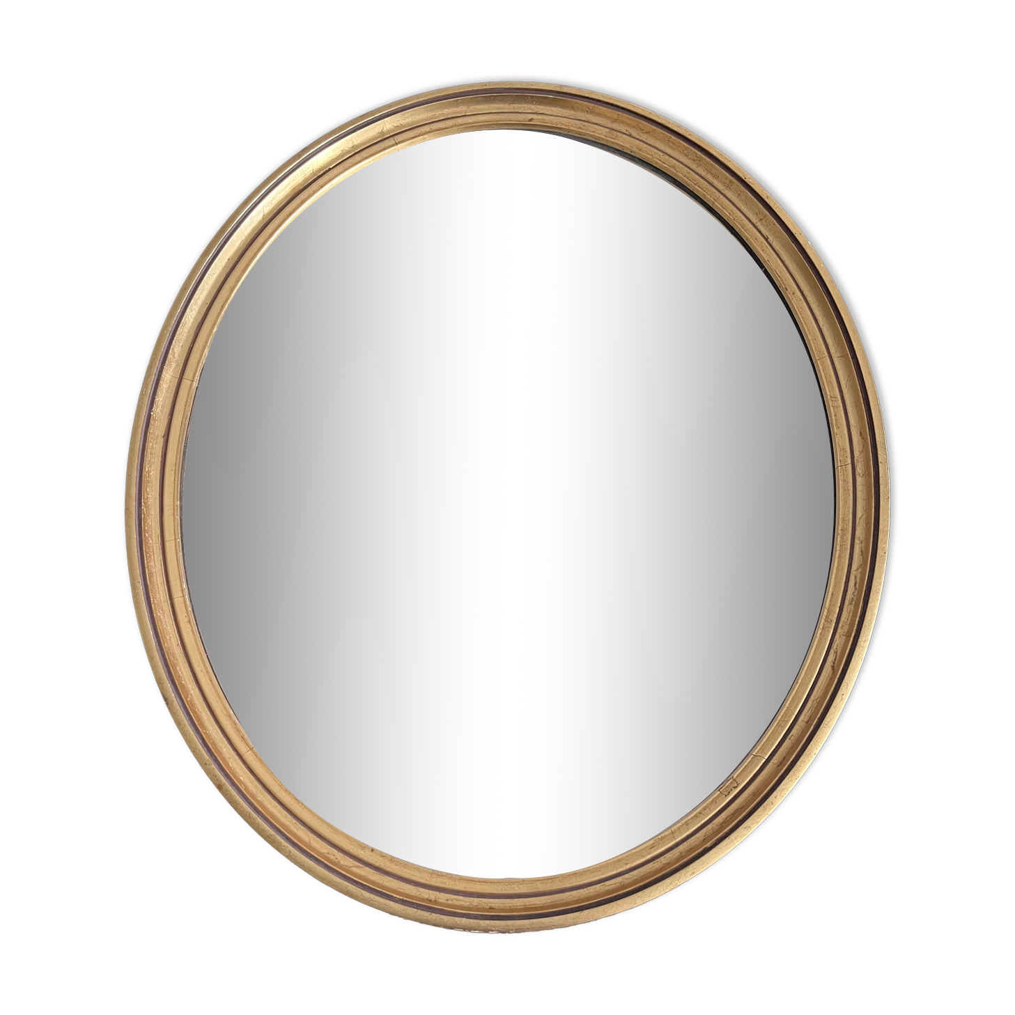 Oval mirror in gilded wood 43x53cm