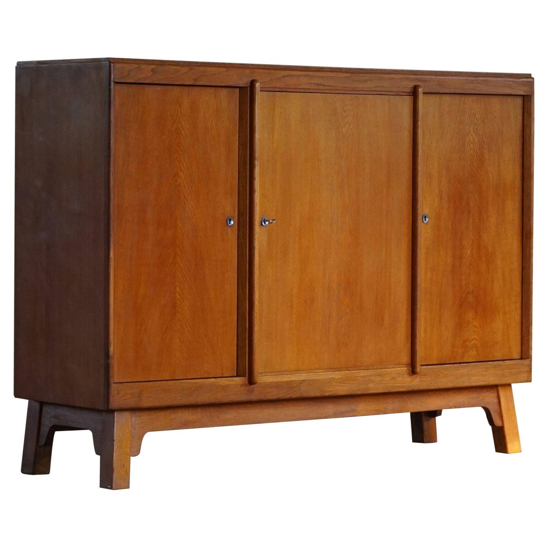 Mid-century buffet/enfilade in teak and oak, Danish cabinetmaker, 1960s