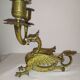 Pair of candlesticks with old chimera dragons hands