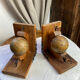Pair of wooden bookends, rotating globes