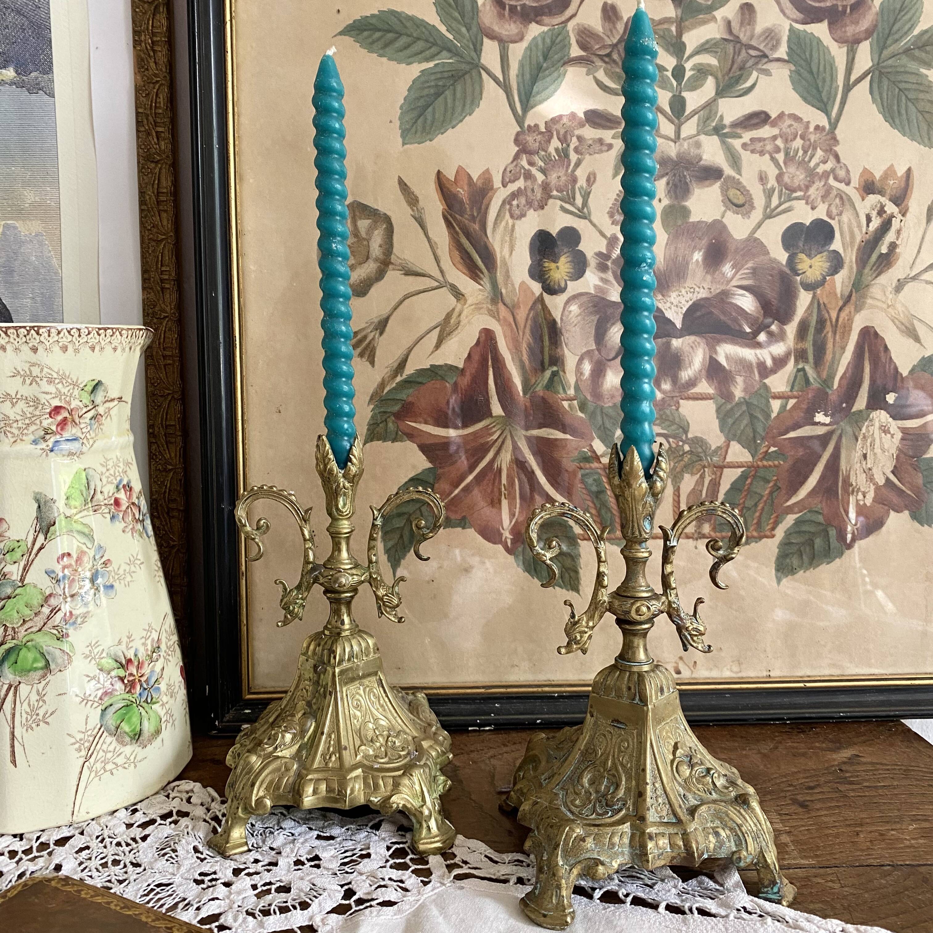 Pair of antique bronze candlesticks