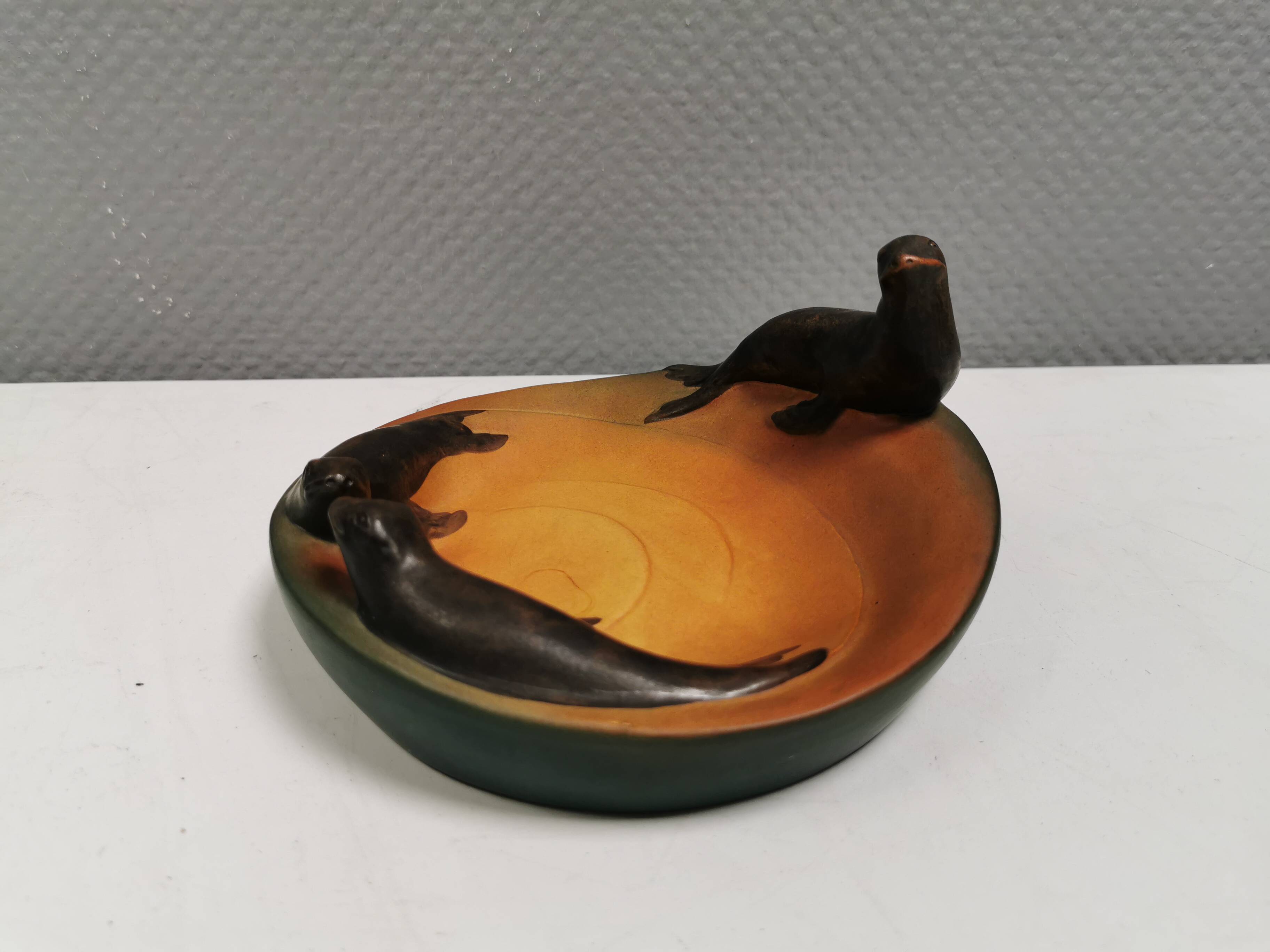 Dish with sea lions hand painted by Ipsen's widow, Denmark 1930s.