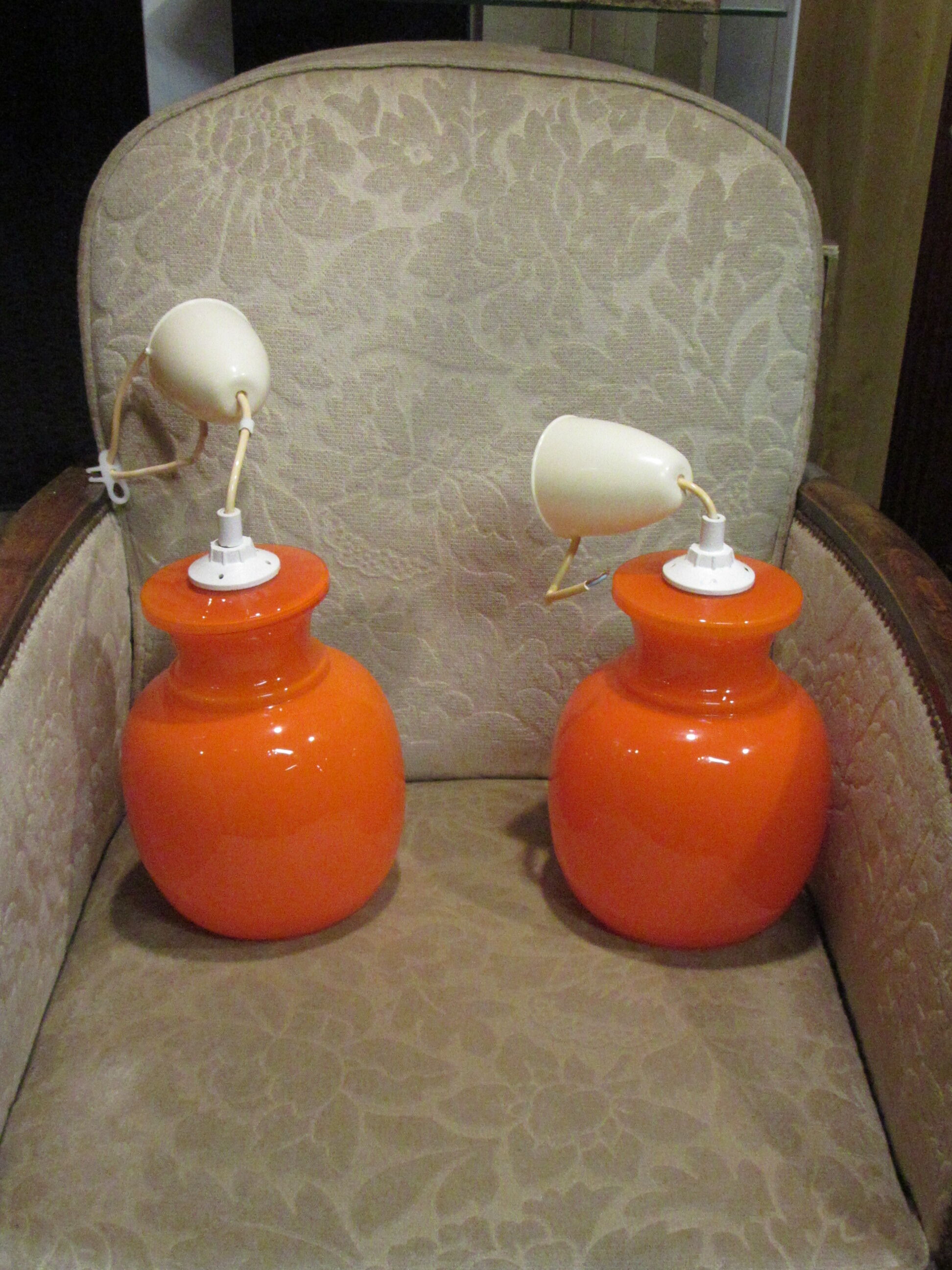 Pair vintage orange hanging lamps