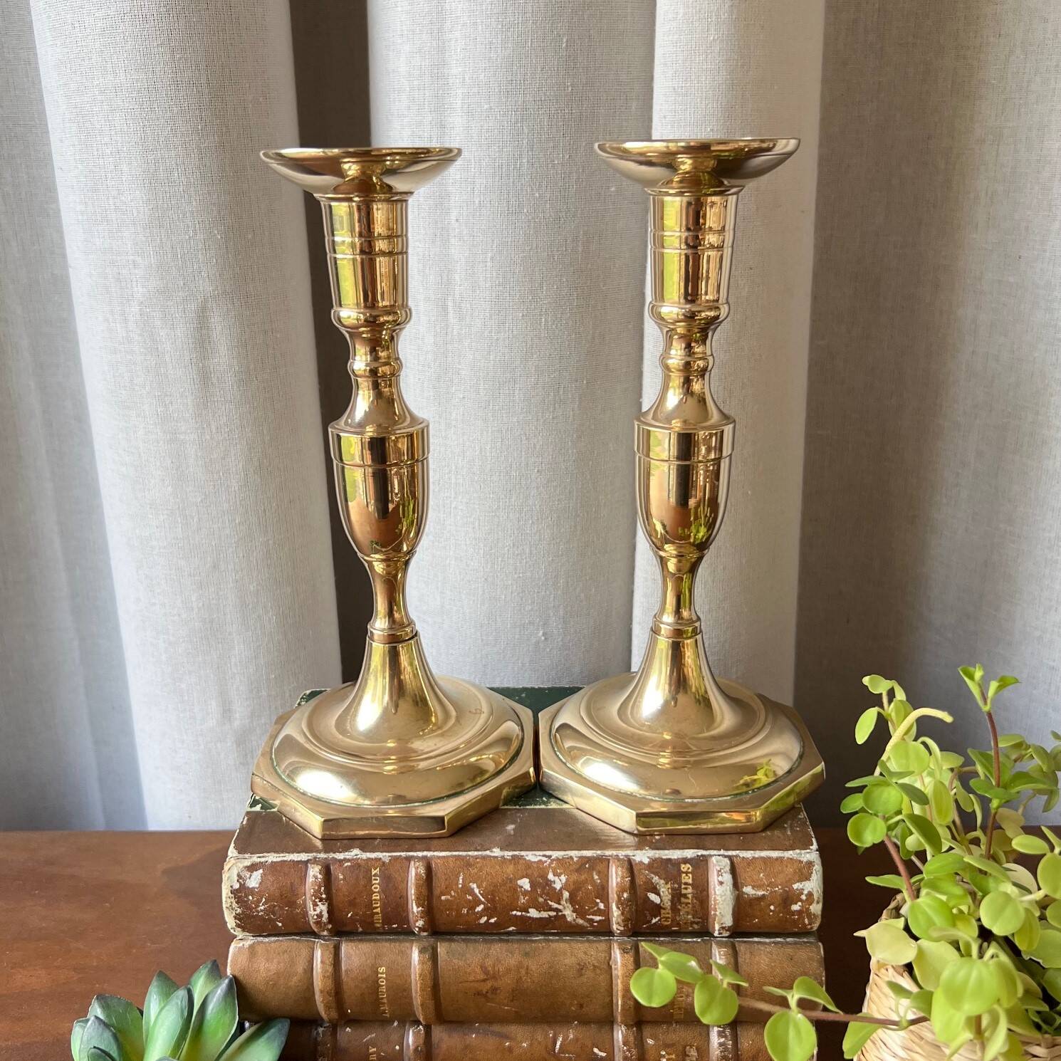 Duo of brass candlesticks
