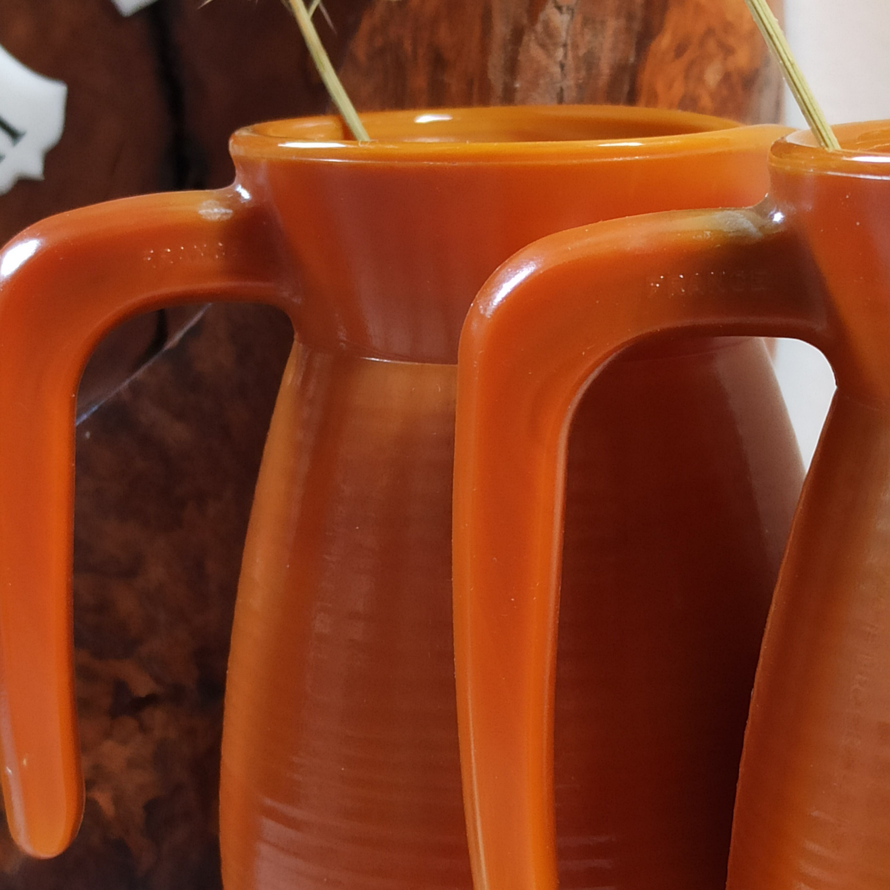 Two vintage arcopal volcano pitchers