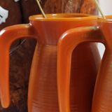 Two vintage arcopal volcano pitchers