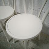 Pair of white Baumann bistro chairs