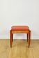 Edmund Homa stool, orange brick structural seat