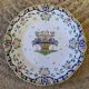 Decorative earthenware plate by René Delarue