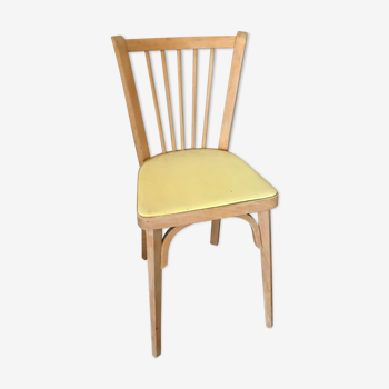 Chaise en bois et skaï jaune