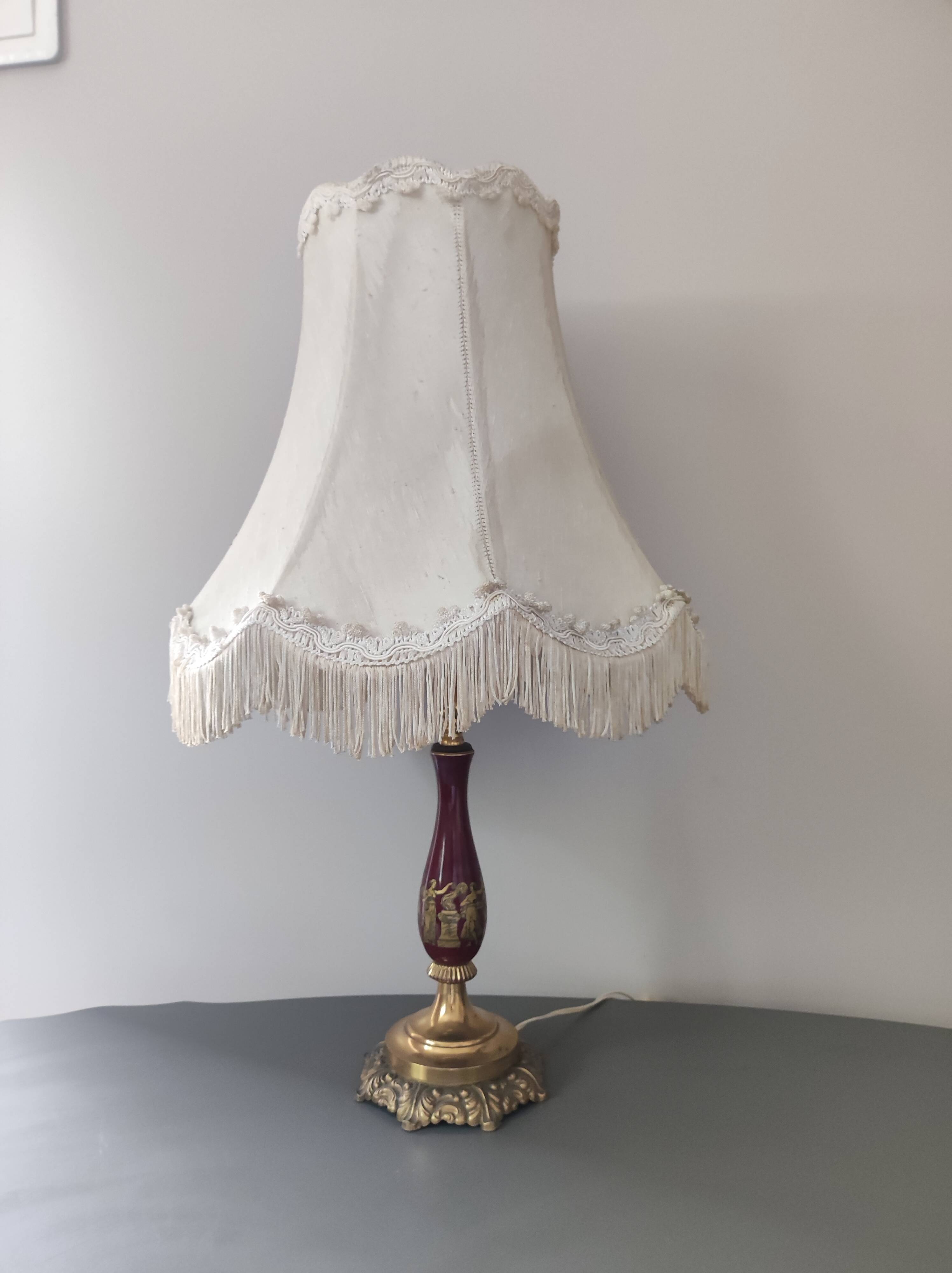 Chiseled bronze foot lamp