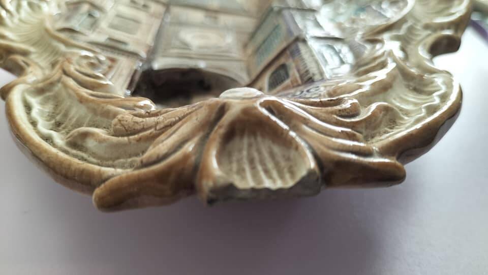 Polychrome slip wall plaque signed WS&S Rouen