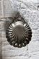 Large vintage shell-shaped platter in shiny silver-plated metal.