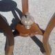 Solid walnut pedestal table with bronze plume, Napoleon III period