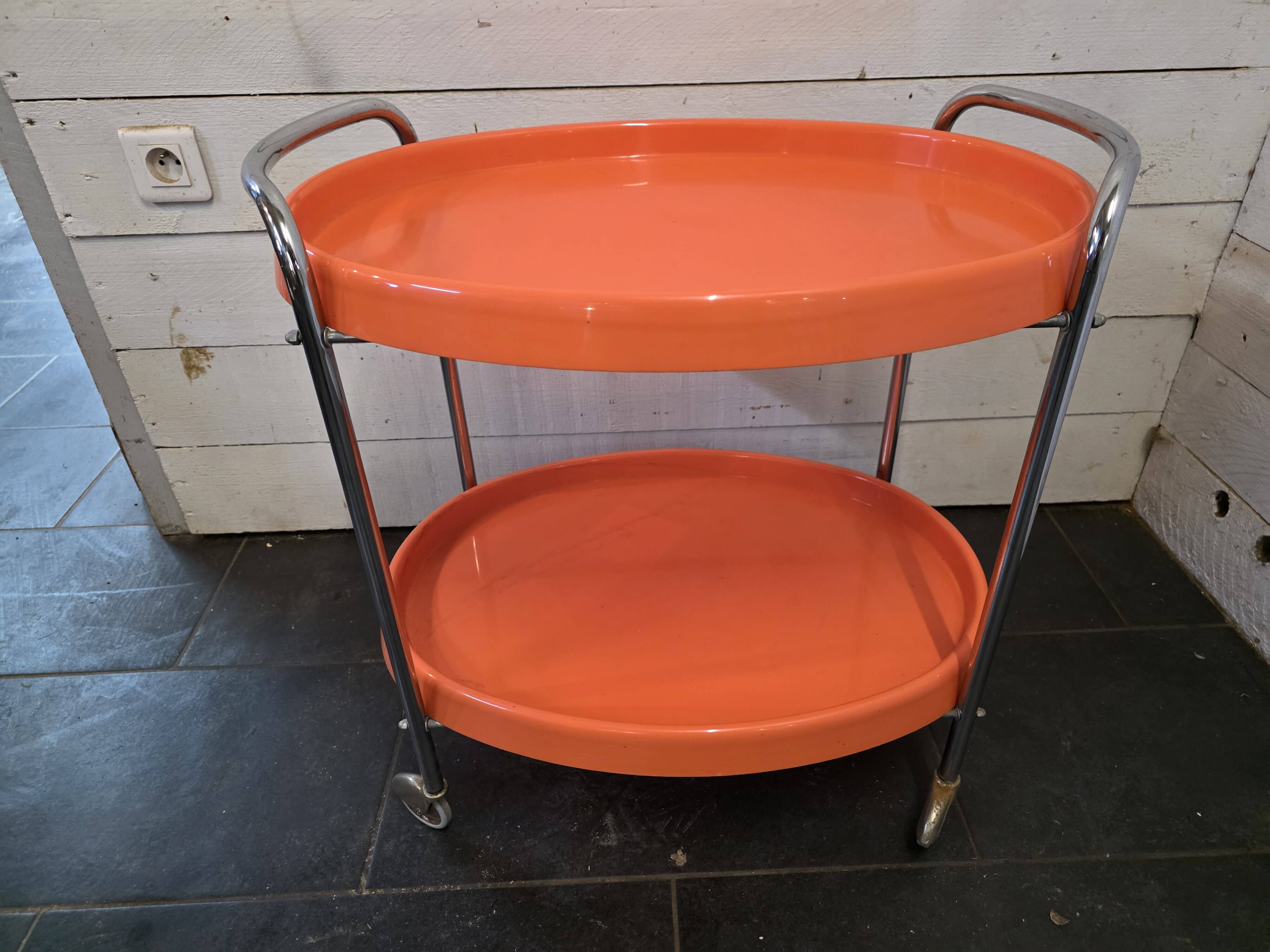 Orange rolling trolley from the 70s