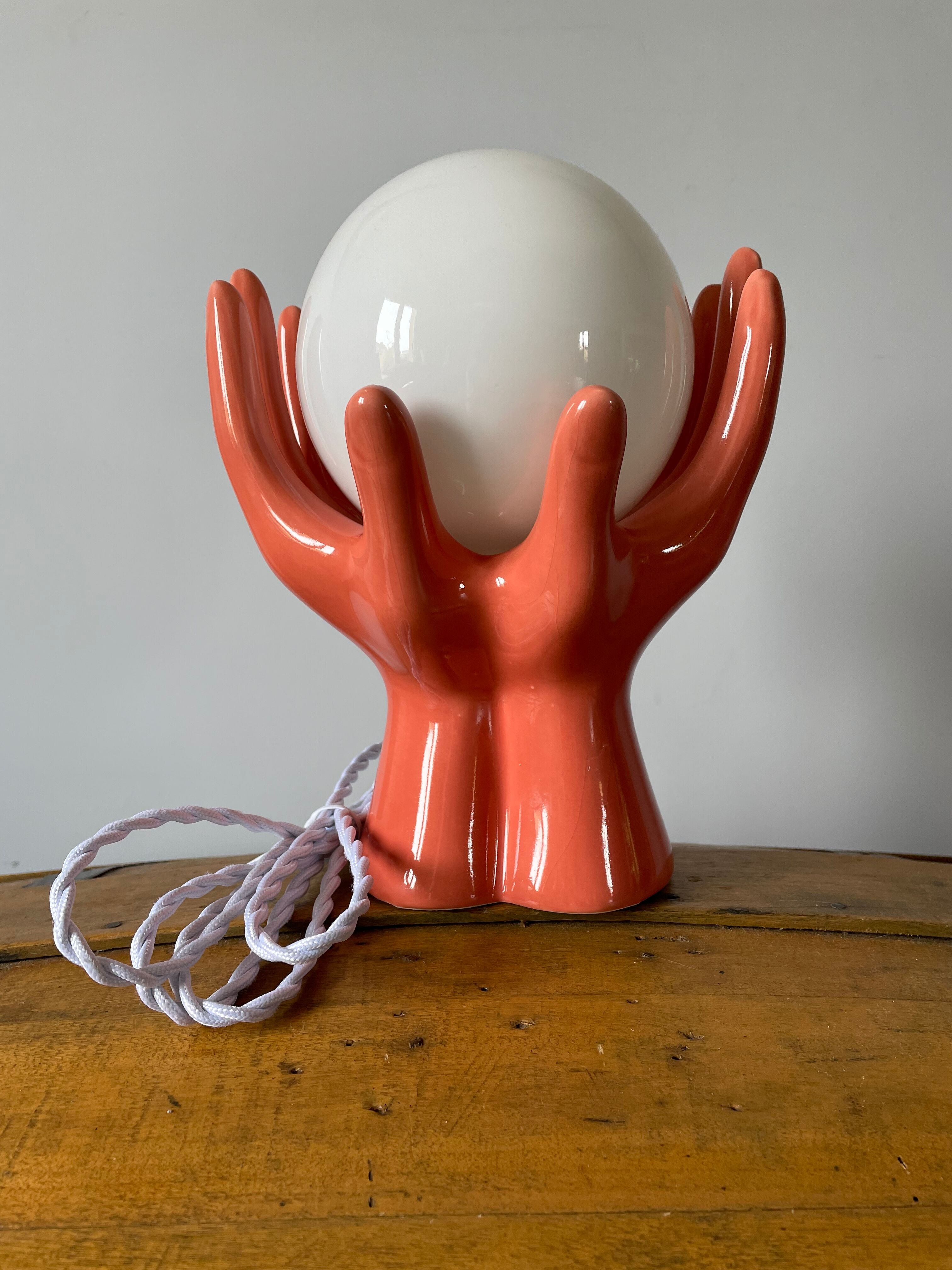Hand lamp in ceramic color coral electrified to new