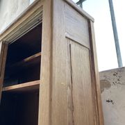 Large row of solid oak loom sliding doors