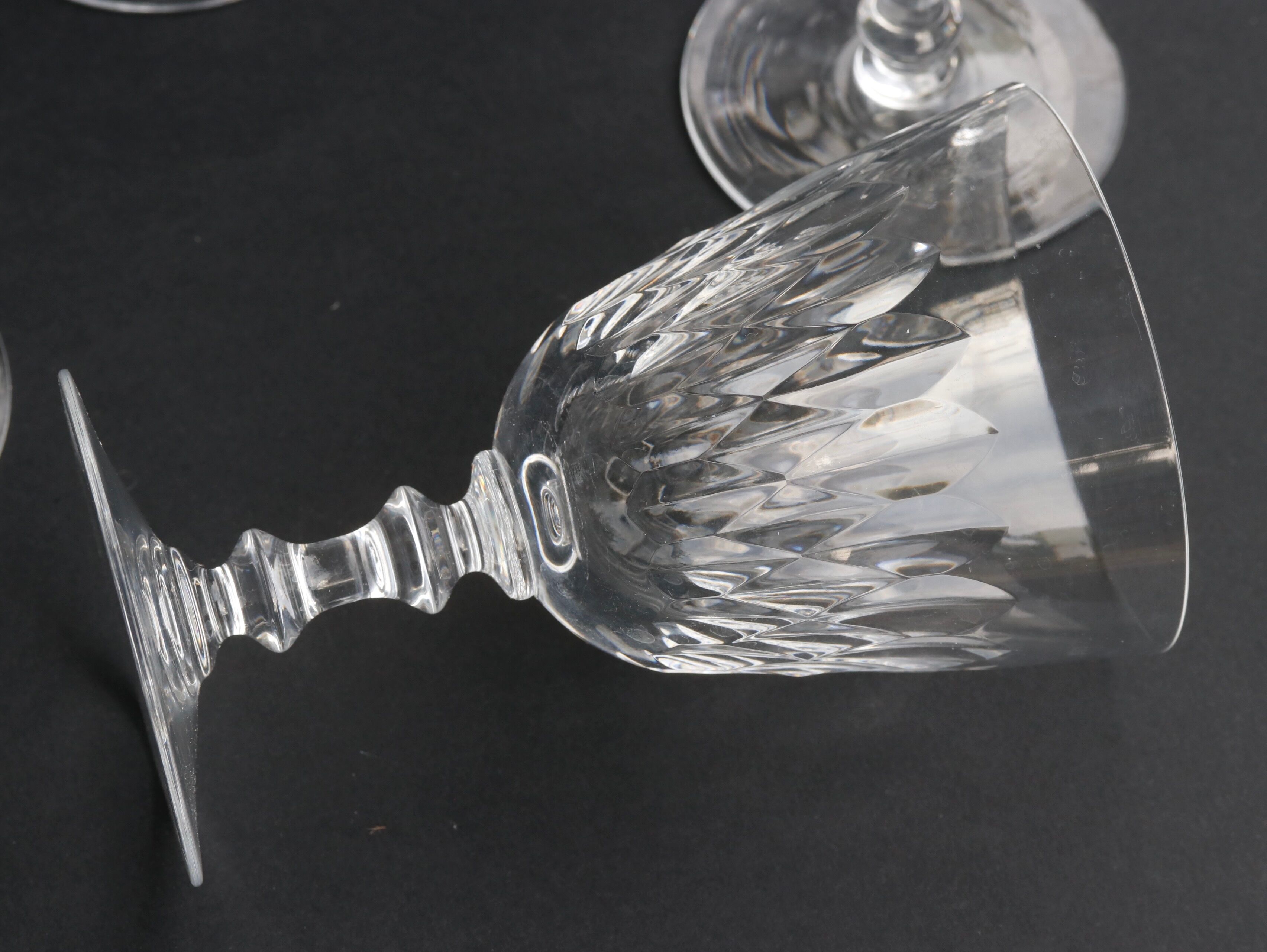 Suite of 6 Baccarat crystal water glasses with honeycomb patterns.