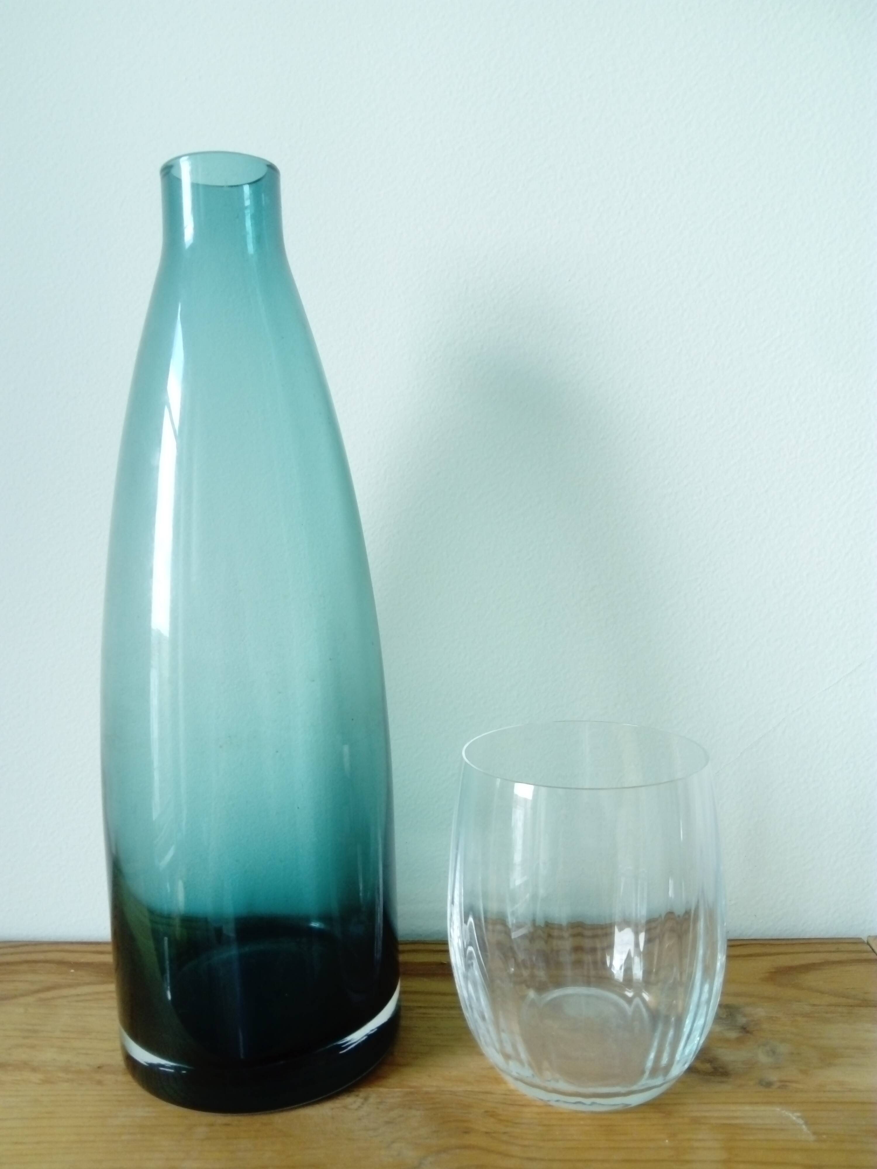 Designer vase in blue-green glass