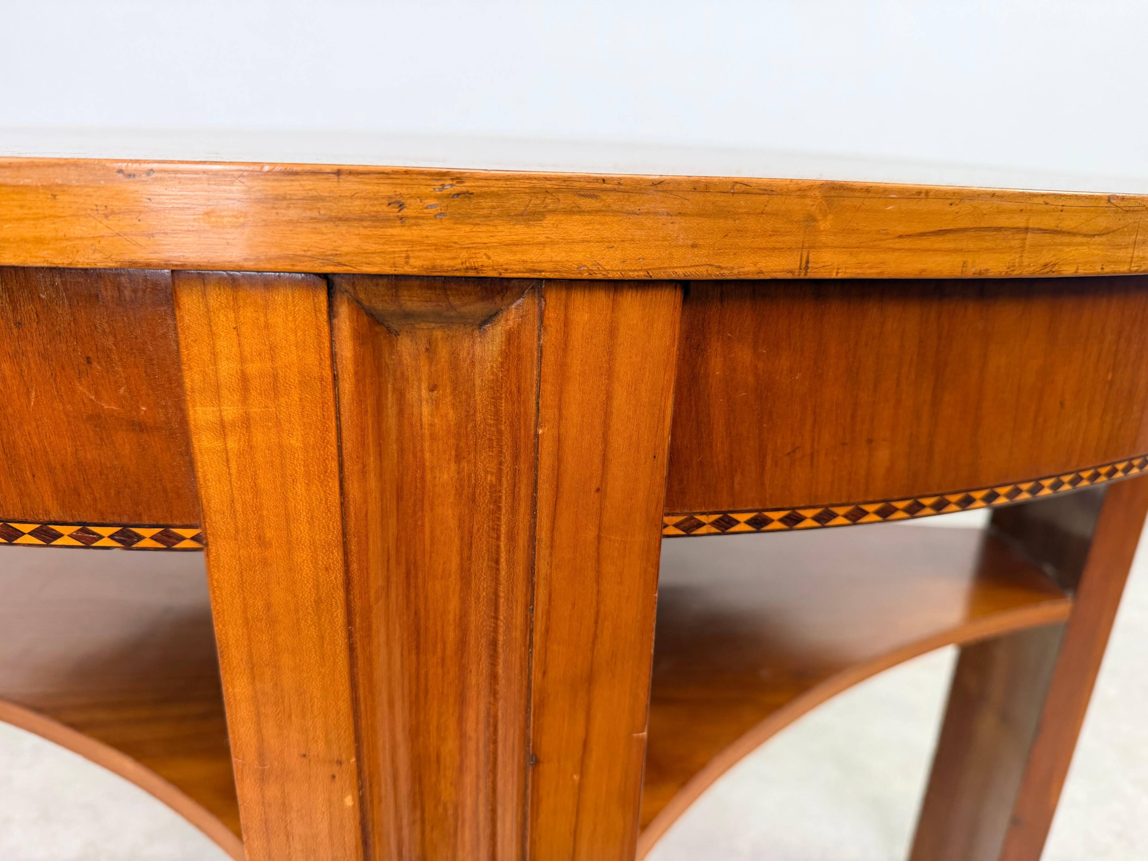 Oval side table in the style of Kolo Moser