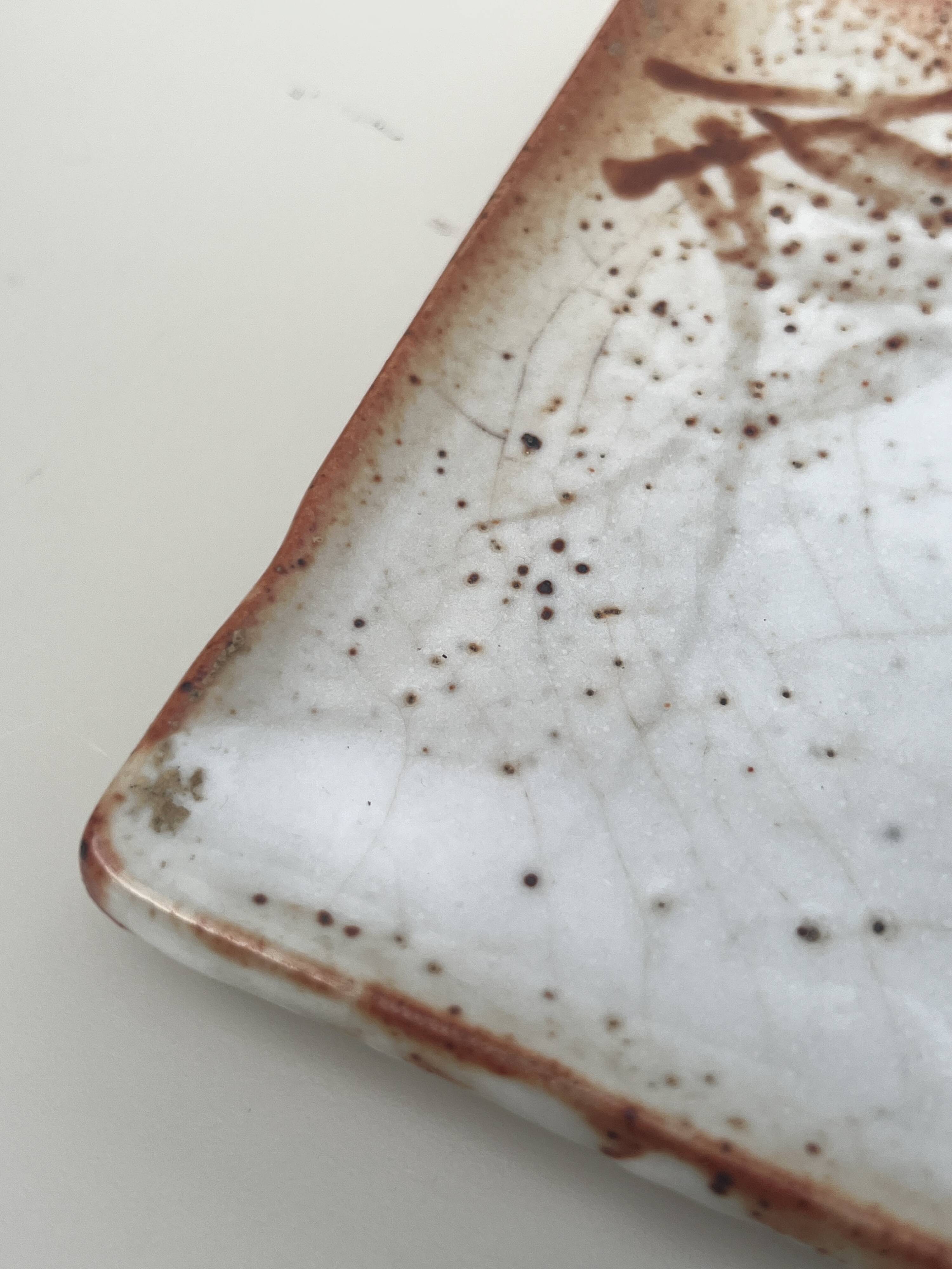 Empty pocket plate in Japanese stoneware.