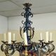 Black and gold patinated wrought iron chandelier – 10 lights – Louis XIV style