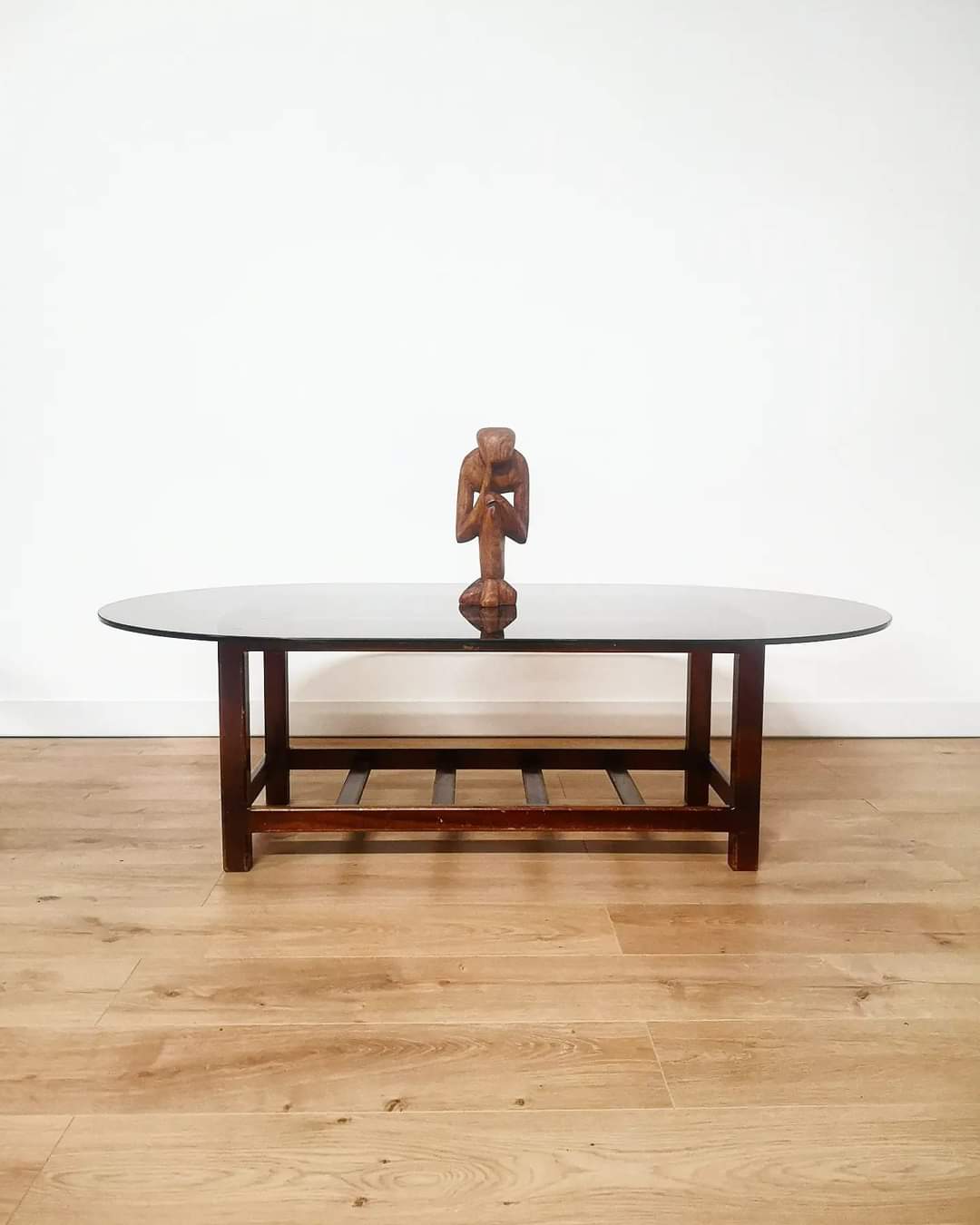 Scandinavian oval smoked glass coffee table