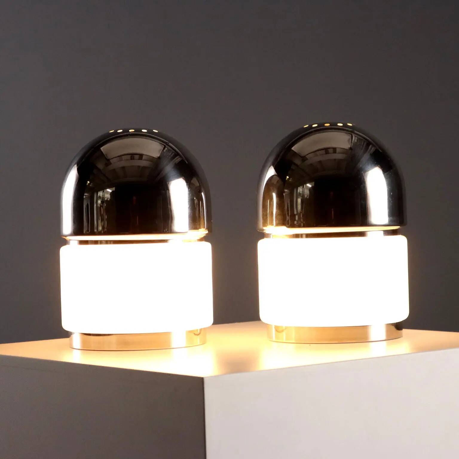 Pair of vintage Reggiani "Salt and Pepper" metal table lamps, 1960s design.