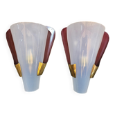 Pair of brass wall lights in Mid Century Modern style attributed to Stilnovo.