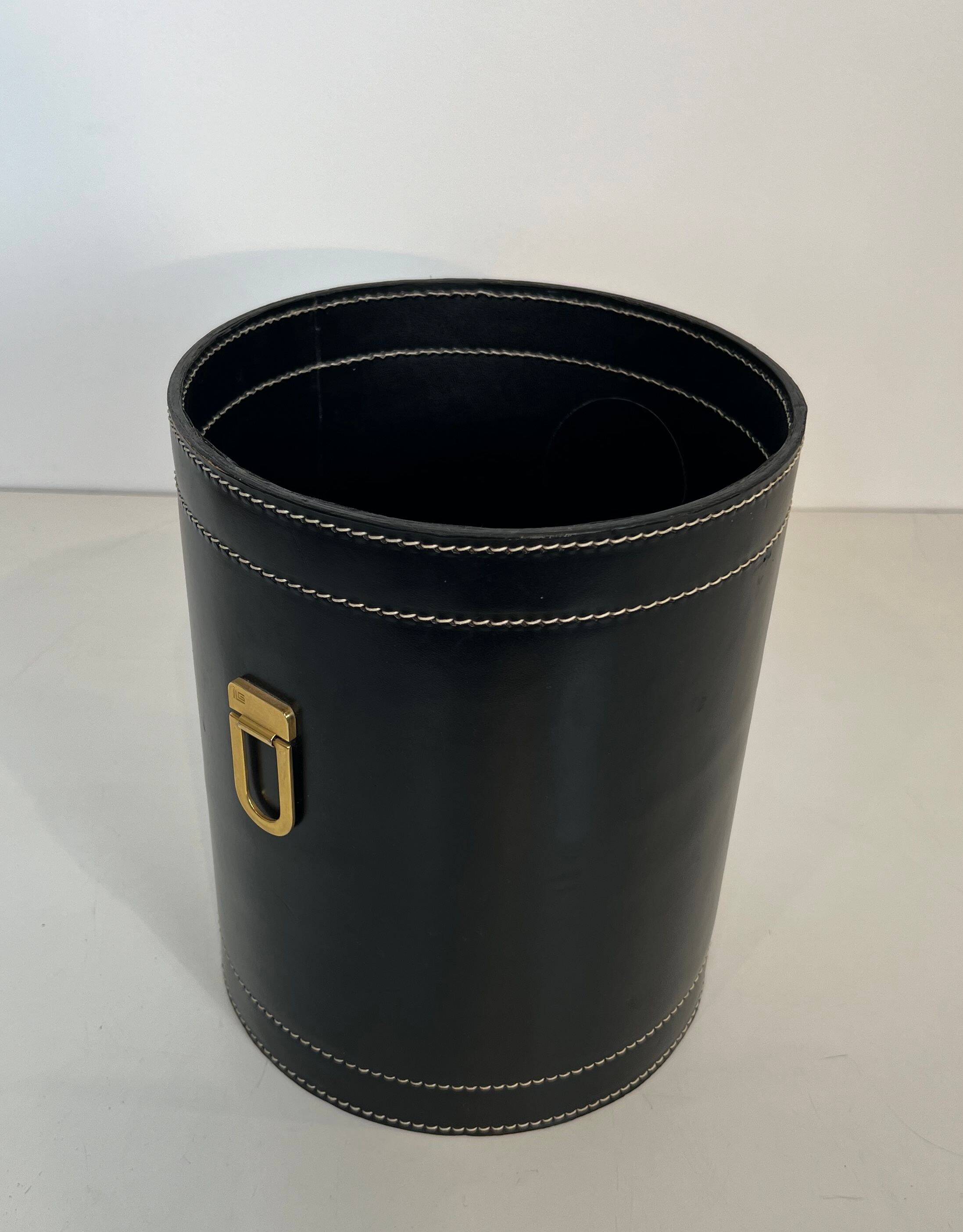Black leather and brass desk basket