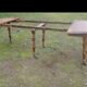 Old solid oak round table, diameter 115cm 6 feet on wheels