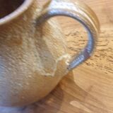 Handmade enameled stoneware pitcher