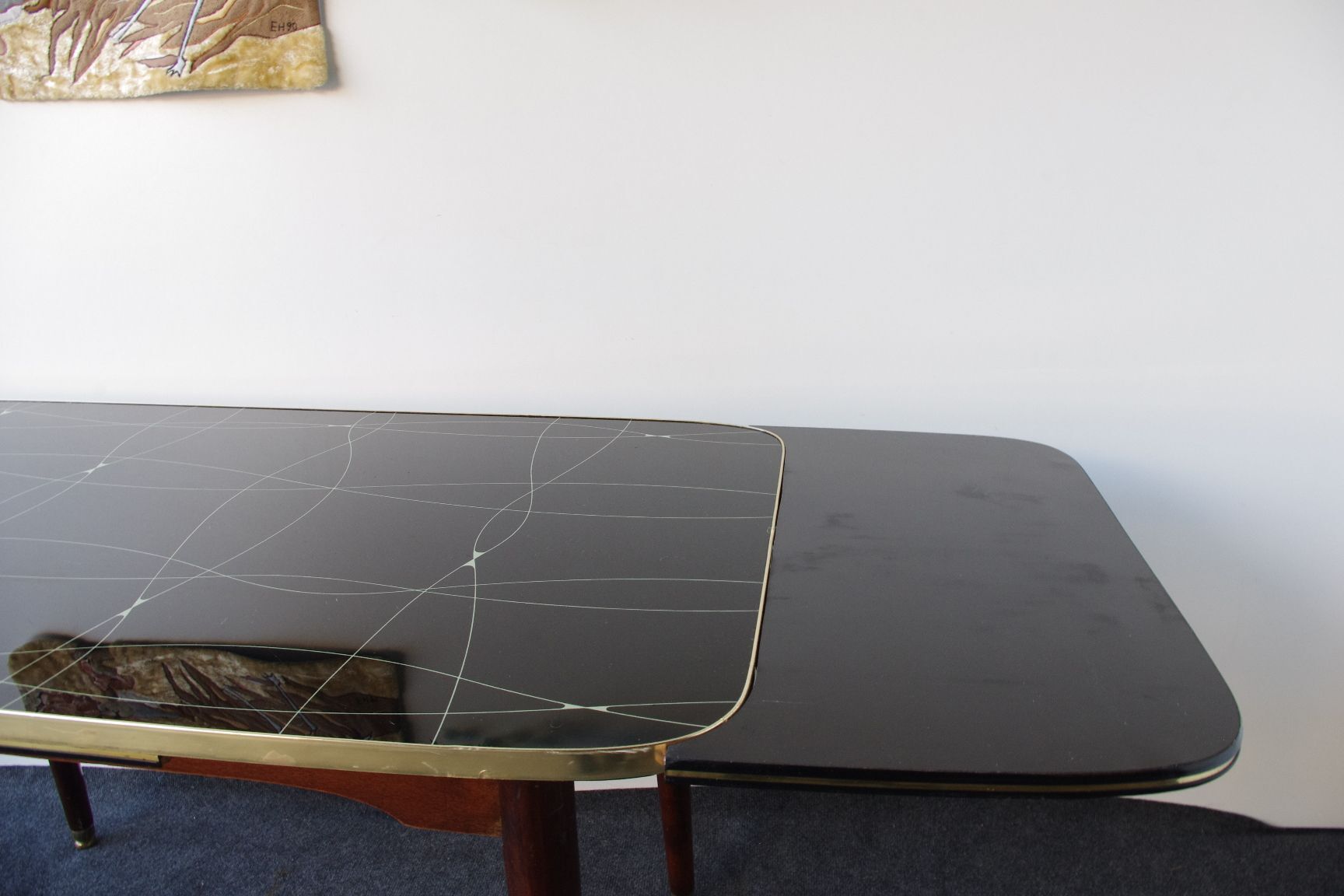 Folding table with black and gold painted glass, 1950