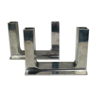 Pair of aluminum design candlesticks