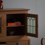 20th-century solid oak display cabinet with a glass front, by a Danish cabinetmaker.