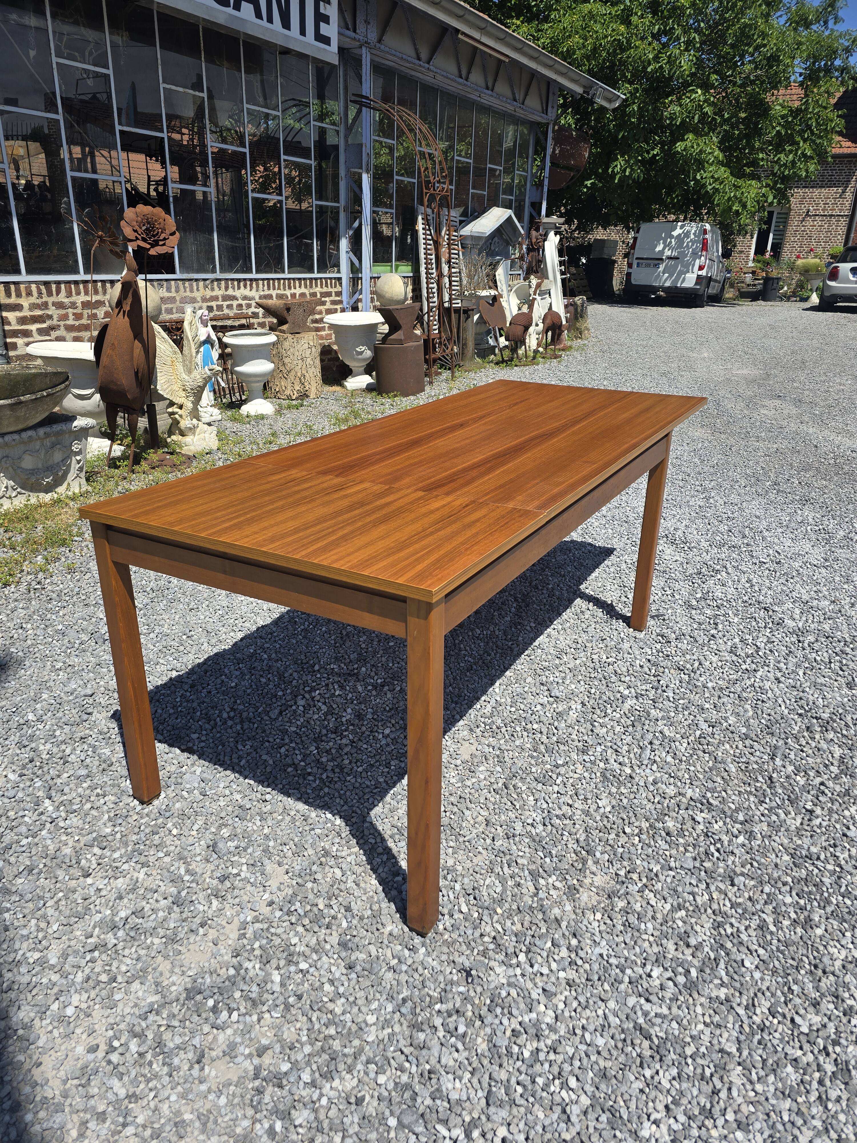 Scandinavian extendable teak table from the 60s