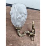 Pair of brass wall lights and glass paste.