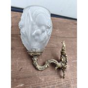 Pair of brass wall lights and glass paste.