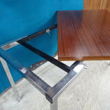 Extendable rise and fall table