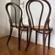 Paire de chaises bistrot en bois et cannage