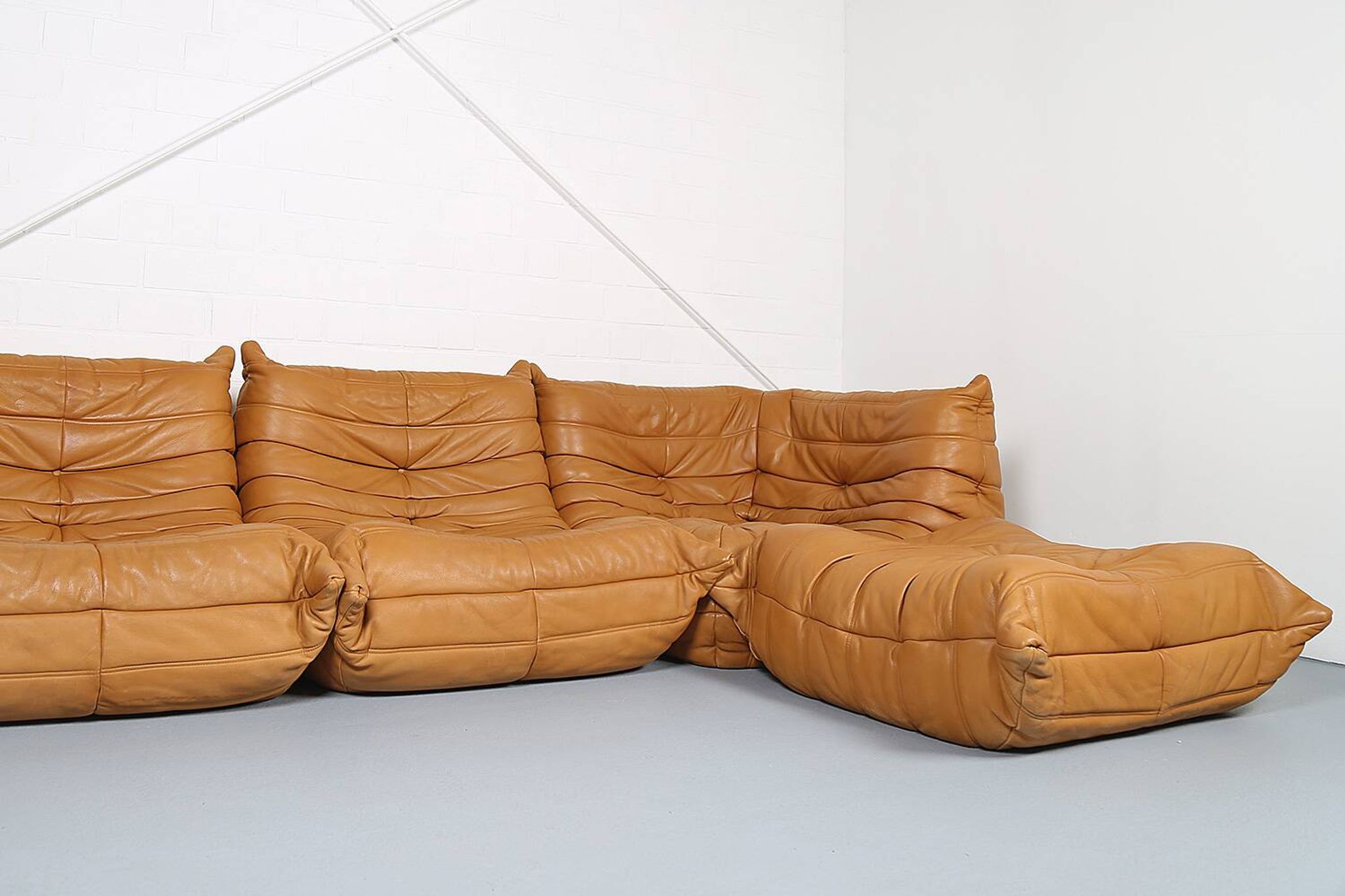 Cognac leather Ligne Roset Togo set from 2010 designed by Michel Ducaroy