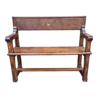 Stylized church pew, early twentieth century, solid wood