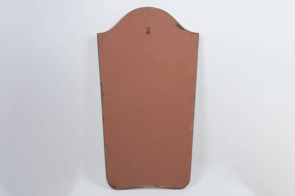 “Gendarme hat” mirror in gilded brass. 1960s.