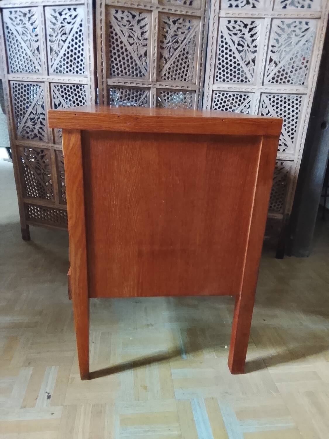 Vintage storage unit with two doors and four drawers.