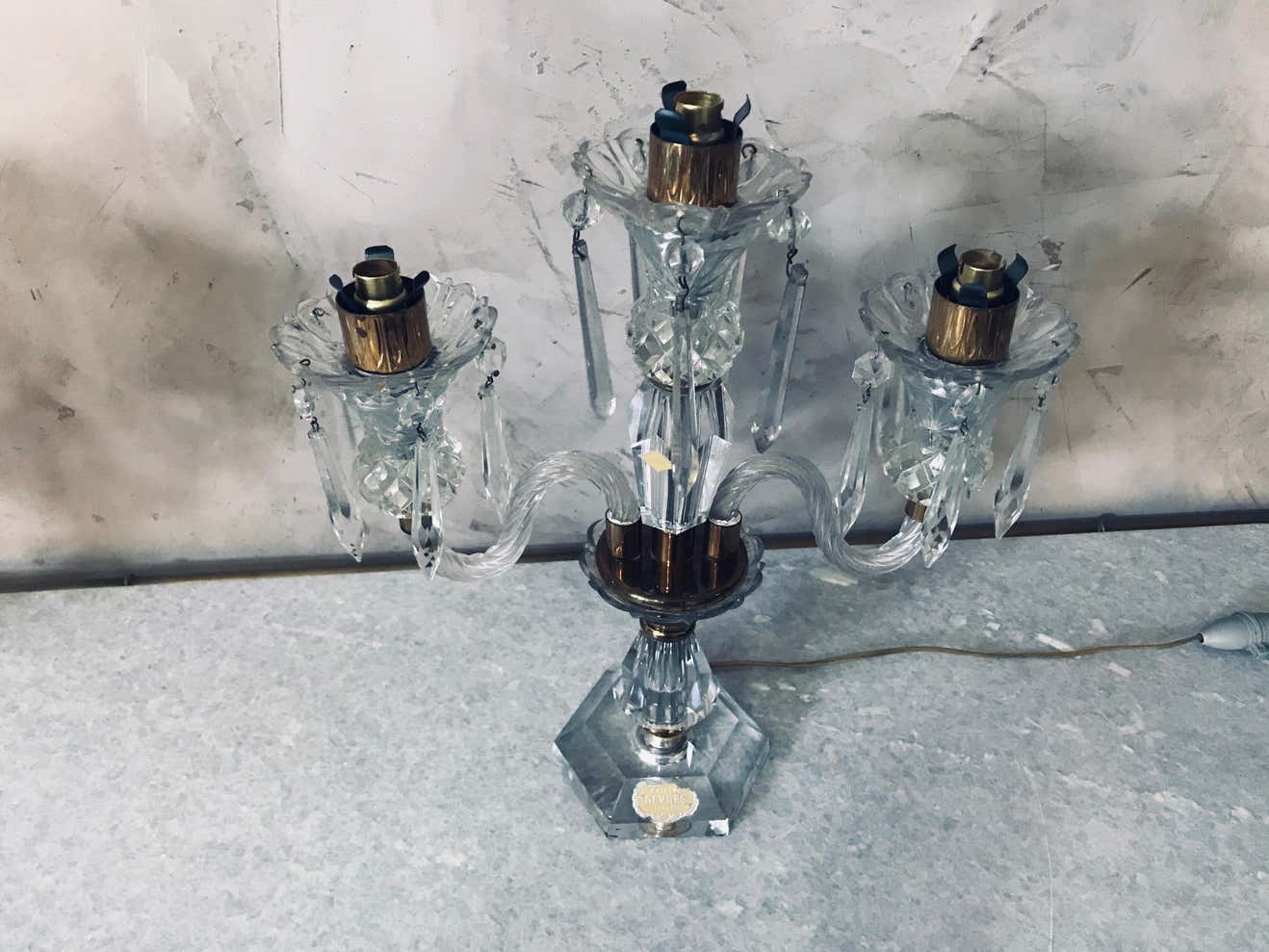 Pair of Sèvres candelabra in crystal and brass of the 20th century France 1950